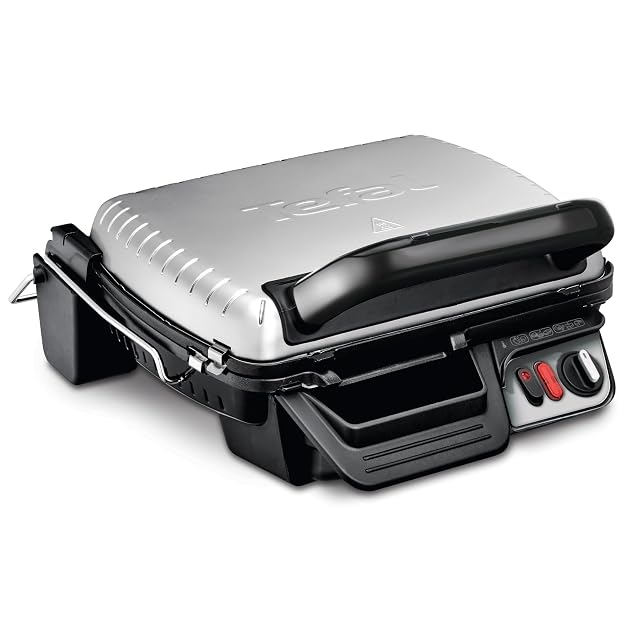 Gril de contact Tefal GC3060 ouvert à plat montrant ses deux plaques
